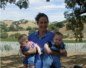 Eileen with Lucy and Owen in the vineyard